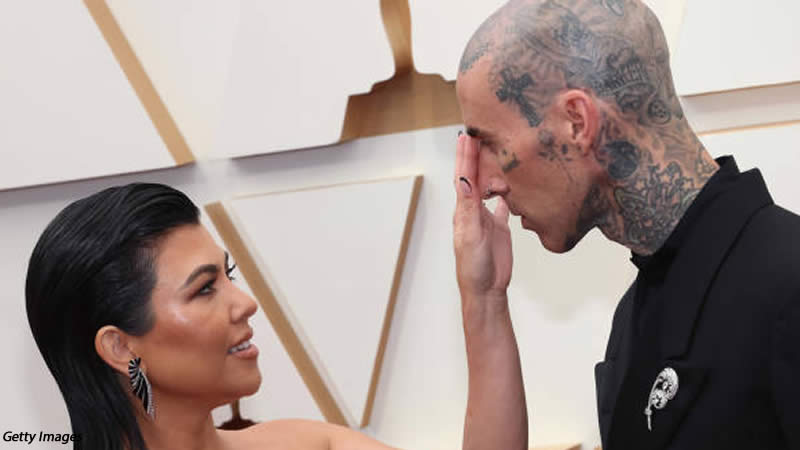 Kourtney Kardashian marries Travis Scott in a Dolce & Gabbana wedding gown with a long veil