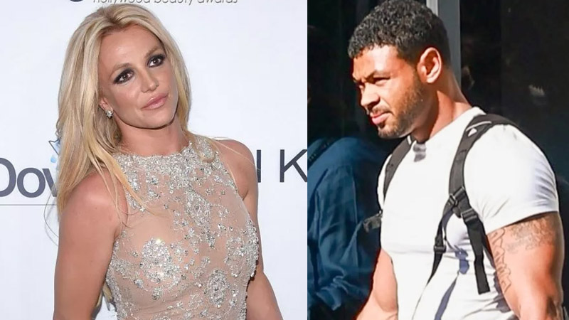 Britney Spears Returns From Cabo Carrying Toy Baby Carrier Alongside Fitness Influencer